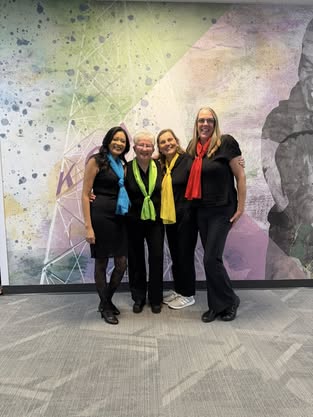 Three CPRC singers smiling together.